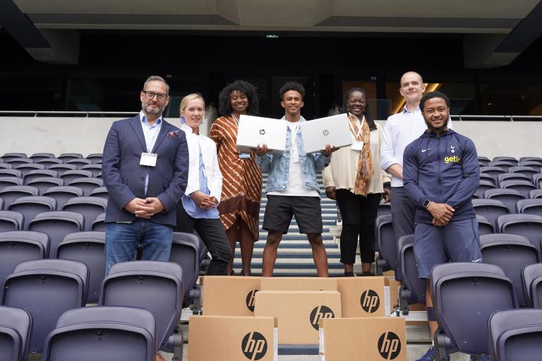 Representatives of Tottenham Hotspur Foundation, HP and Haringey Council with one of the first young people to receive a laptop, Ebrahim