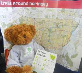 Hari Bear with a 'Trails around Haringey' map.