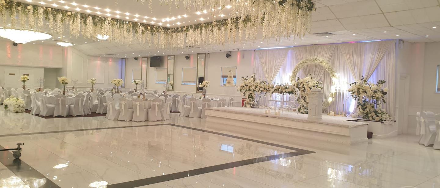 The Grand Ballroom of La Royale Banqueting Suite with chairs and tables laid out for a ceremony